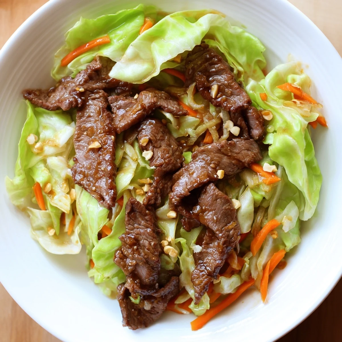 Vibrant strips of beef and crisp green cabbage wok-tossed in a glossy, savory Asian-inspired sauce.  