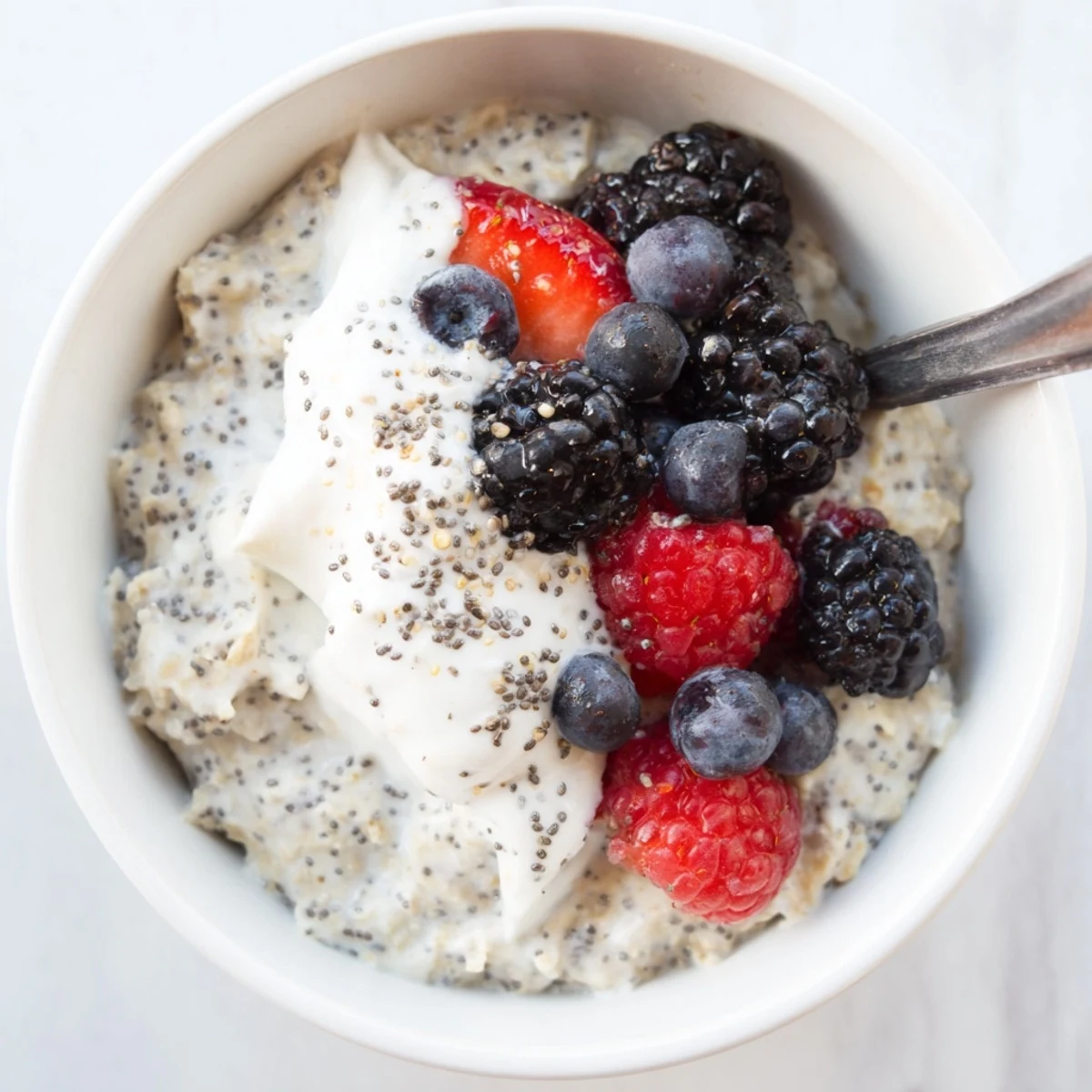 This chilled Vegan Lemon Poppy Seed Overnight Oats recipe features a bright lemon flavor and crunchy poppy seeds in every spoonful.