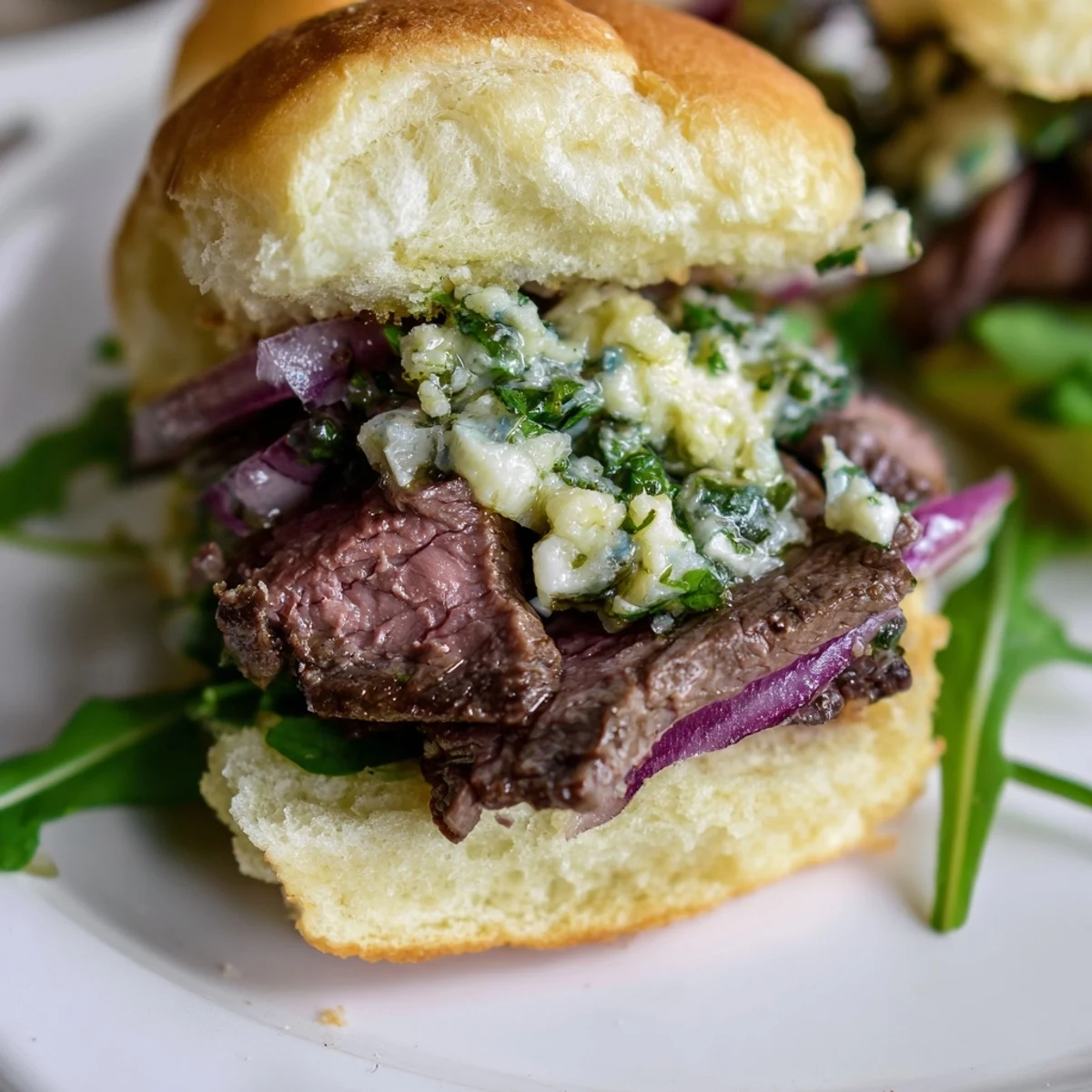 Game day Cowboy Butter Steak Sliders with tender steak, garlic herb butter, and fresh greens on golden slider buns.