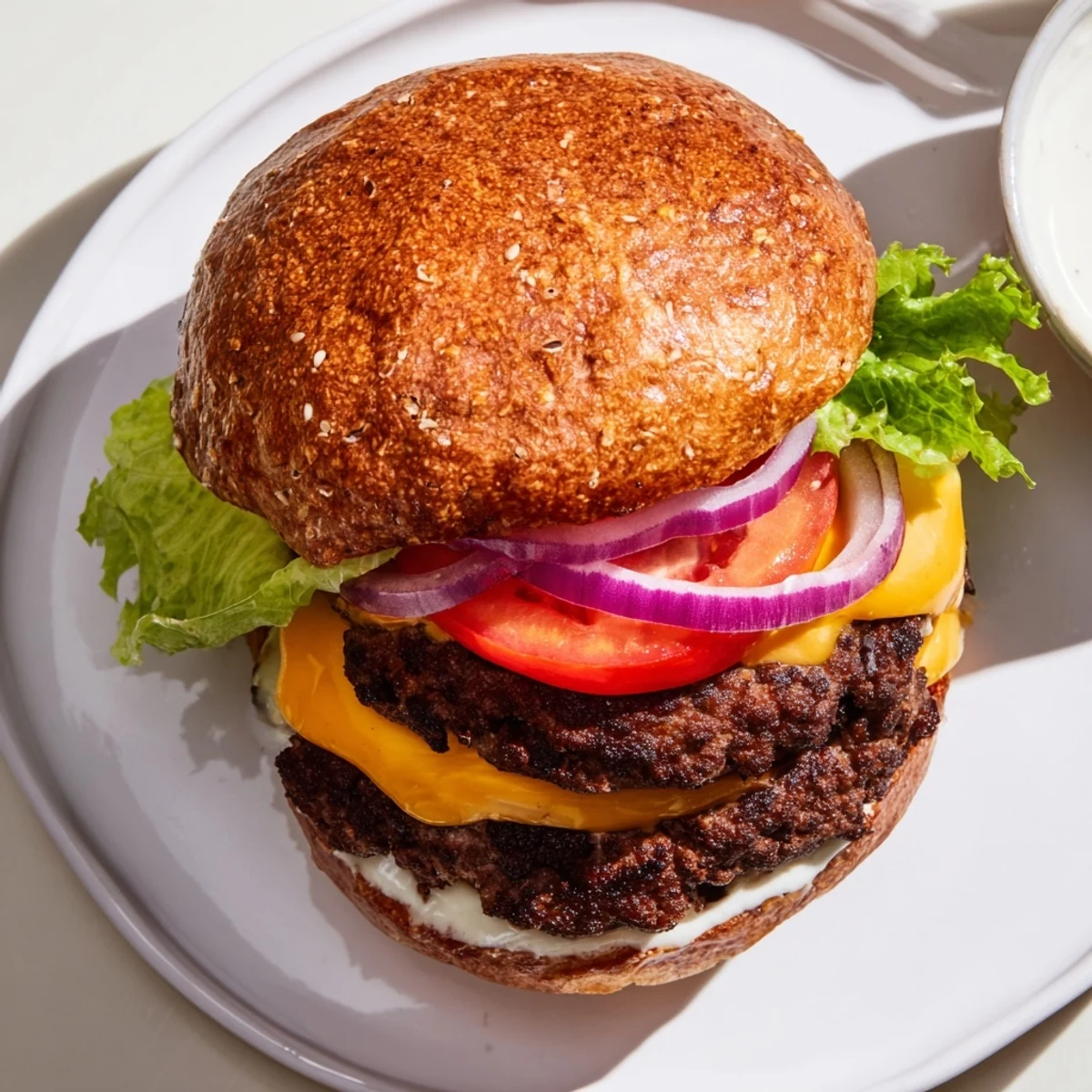 Juicy American smash burger featuring crispy edges, melted cheese, and crisp lettuce tomato